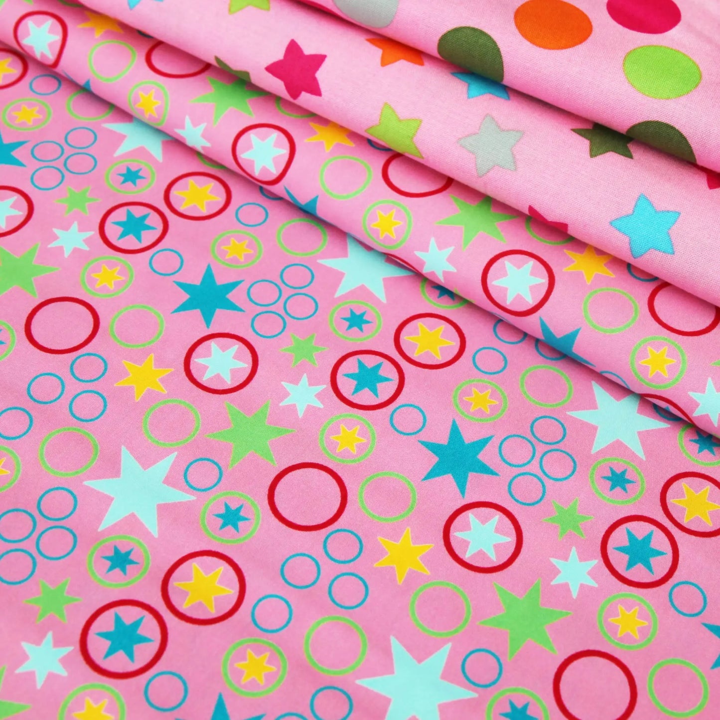 Baumwollstoff bunte Sterne - Kreise auf pink TONI STARS von Swafing Stoffe Kudellino