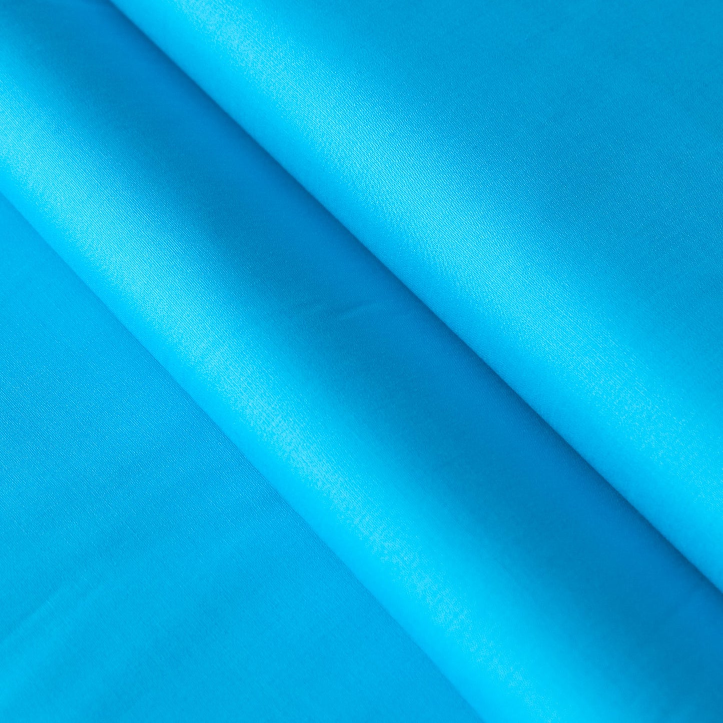 Baumwollstoff Uni in leuchtendem Türkis, Stoffe-Kudellino Sale Qualität.