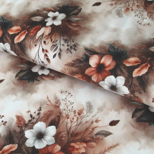 Baumwolljersey mit Blumenmuster in Braun, Beige und Rosttönen, sanft verlaufender Hintergrund.