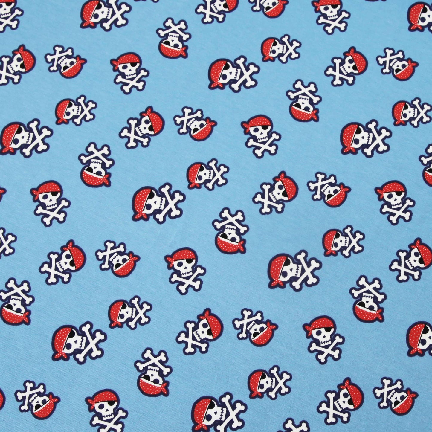 Baumwolljersey "Piraten Totenköpfe auf blau" - Jersey Stoff mit Skulls Seeräuber - Stoffe Kudellino - Bündchenstoffe, Jersey Stoffe und mehr...