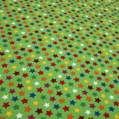 Baumwolljersey "10mm bunte Sterne auf grün" -  Jersey Stoff - Stoffe Kudellino