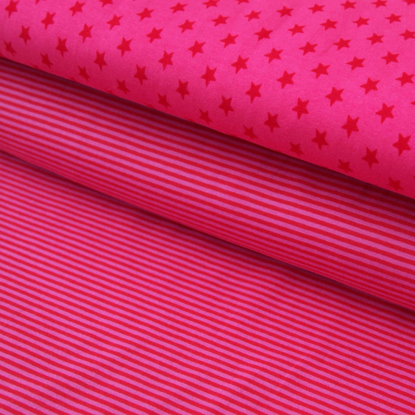 Baumwolljersey "rote 1cm Sterne auf fuchsia" - Jersey Stoff in pink kaufen