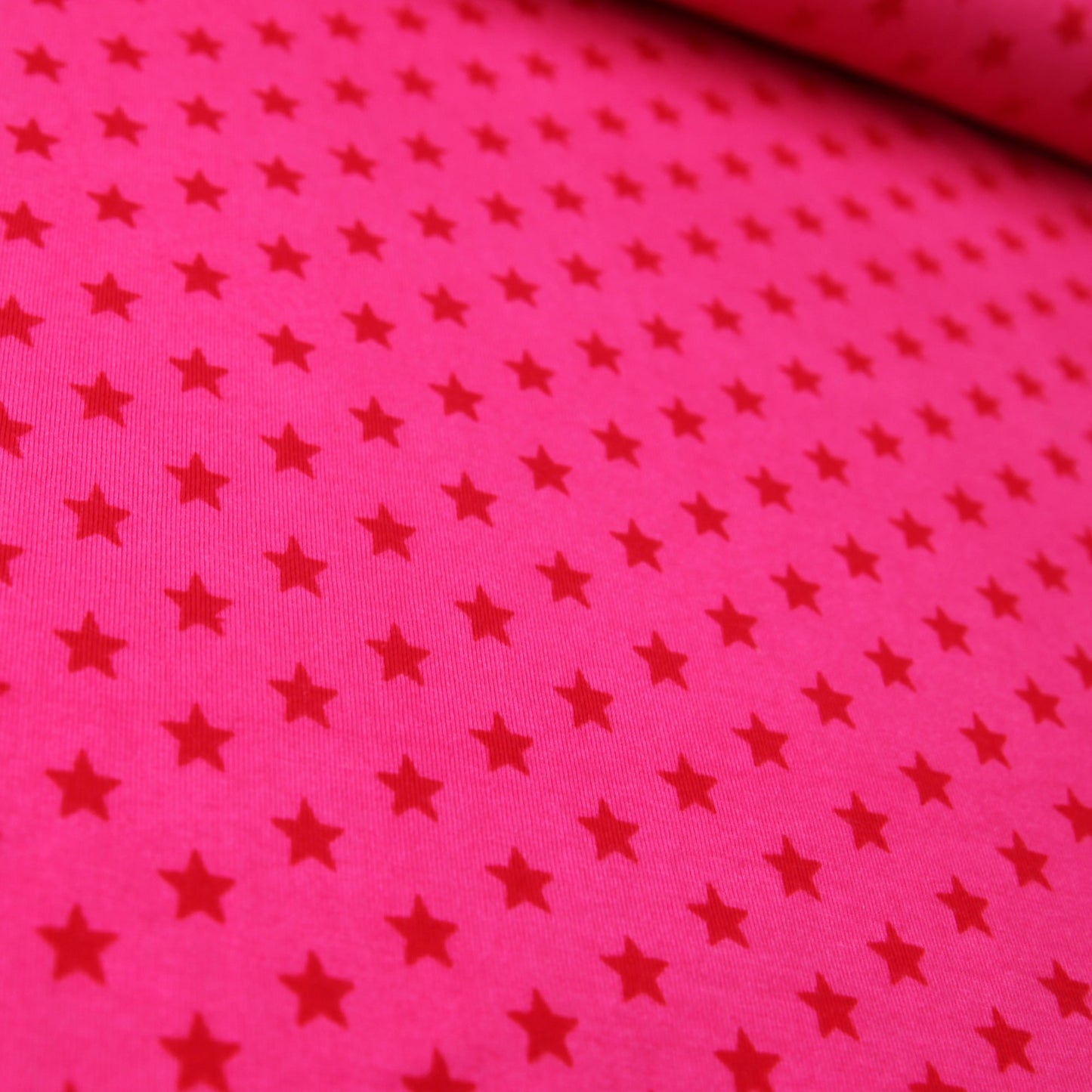 Baumwolljersey "rote 1cm Sterne auf fuchsia" - Jersey Stoff in pink Kudella