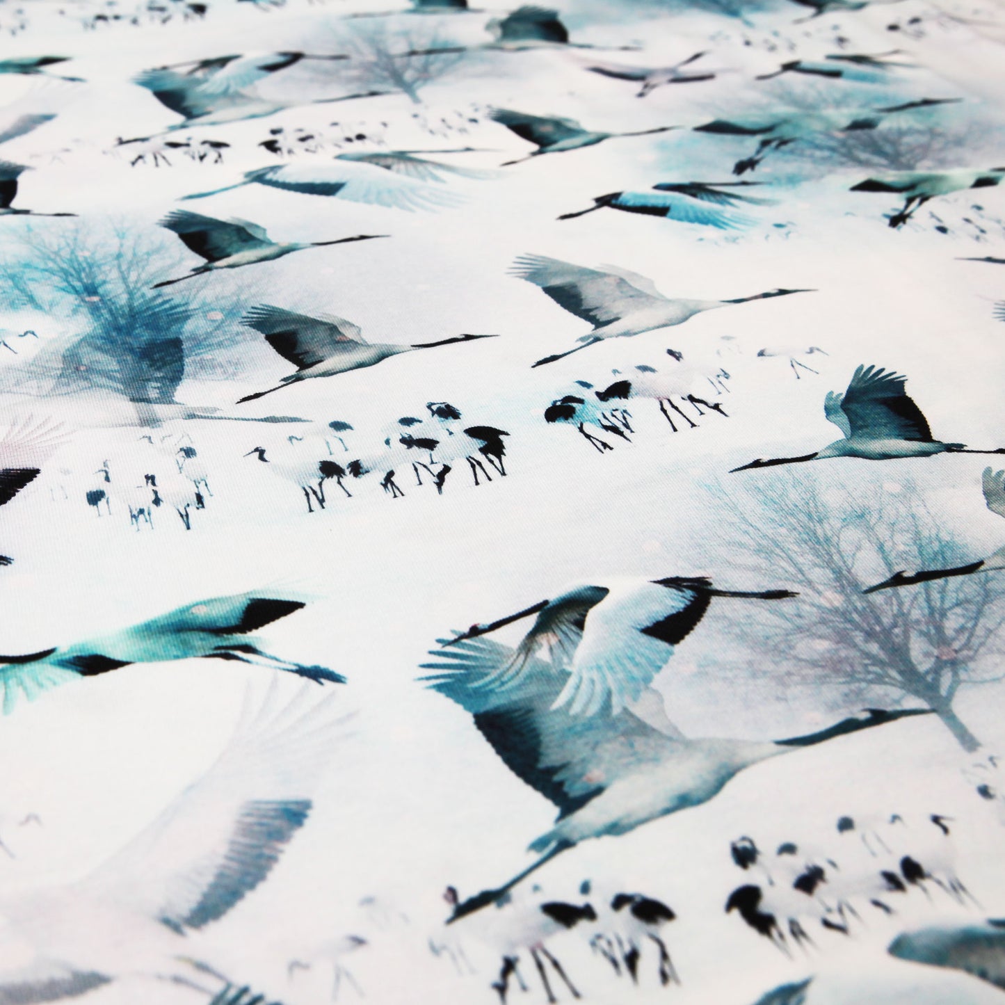 Baumwolljersey "Kraniche - Zugvögel auf weiß / blau" - Jersey StoffJersey BedrucktStoffe KudellinoStoffe Kudellino