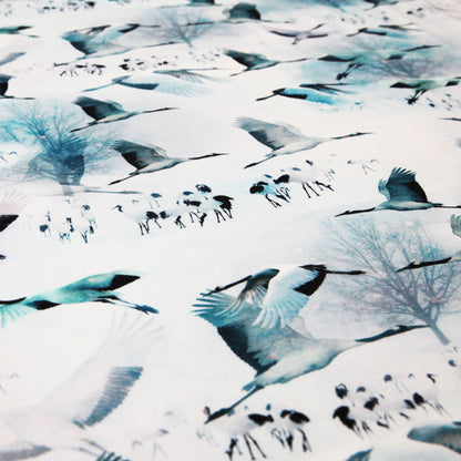 Baumwolljersey "Kraniche - Zugvögel auf weiß / blau" - Jersey StoffJersey BedrucktStoffe KudellinoStoffe Kudellino